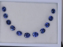 Load and play video in Gallery viewer, 25.05ct Natural  Blue Sapphire set

